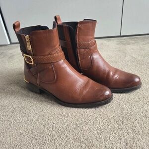 Chic Brown Ankle Boots with Gold Accents